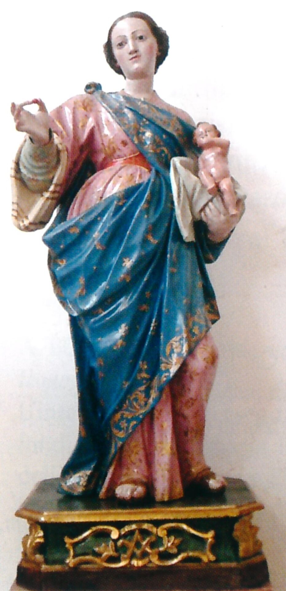 Fig. 3 – PIRRI, Chiesa di S. Pietro, Madonna delle Grazie, scultura lignea con policromia, bottega di G.A. Lonis, fine sec. XVIII-prirni sec. XIX.